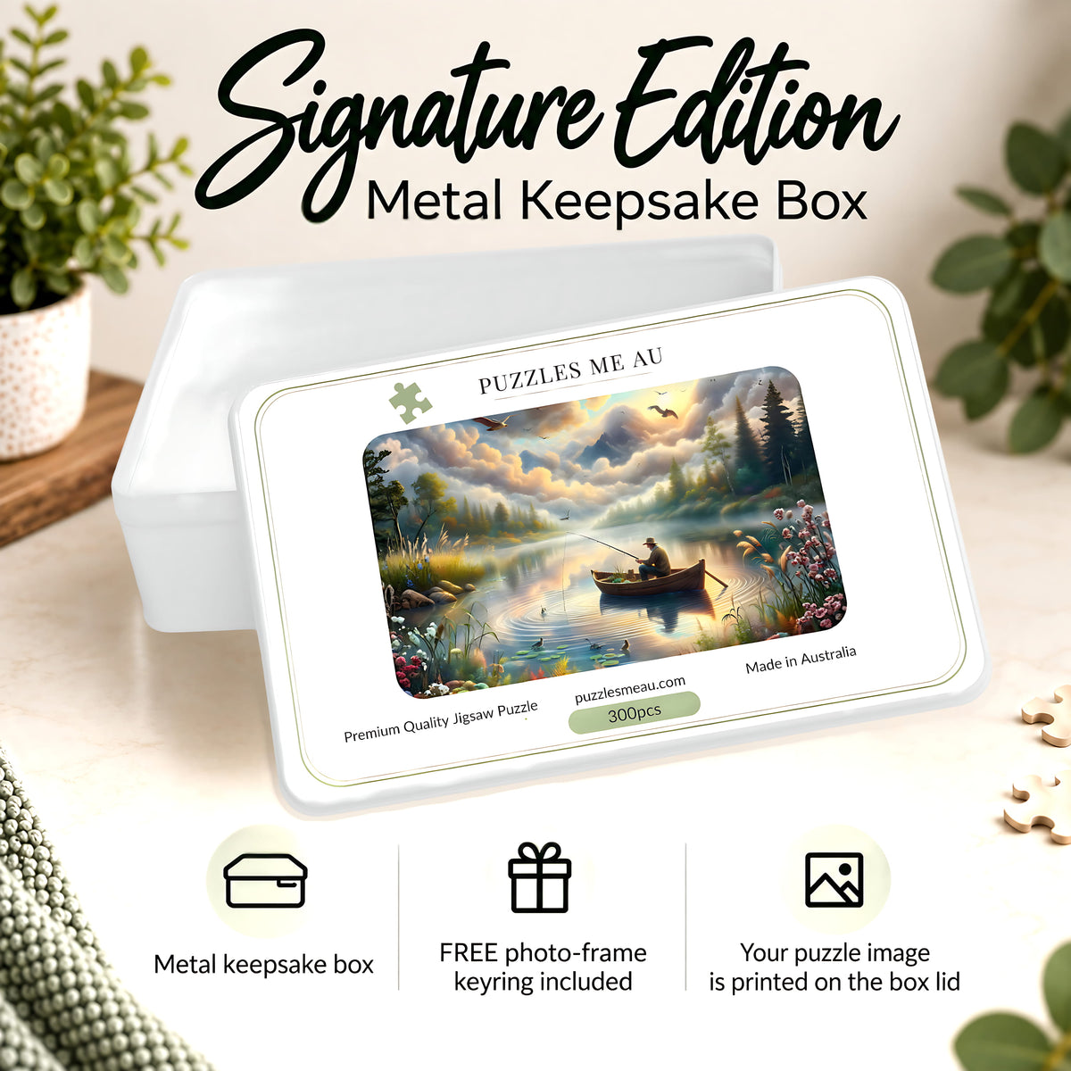 Puzzles Me AU Signature Edition metal keepsake box for Fisherman's Lake at Dawn jigsaw puzzle - serene misty sunrise lake scene with lone fisherman in rowboat surrounded by wildflowers, premium gift-ready packaging, handmade in Queensland Australia