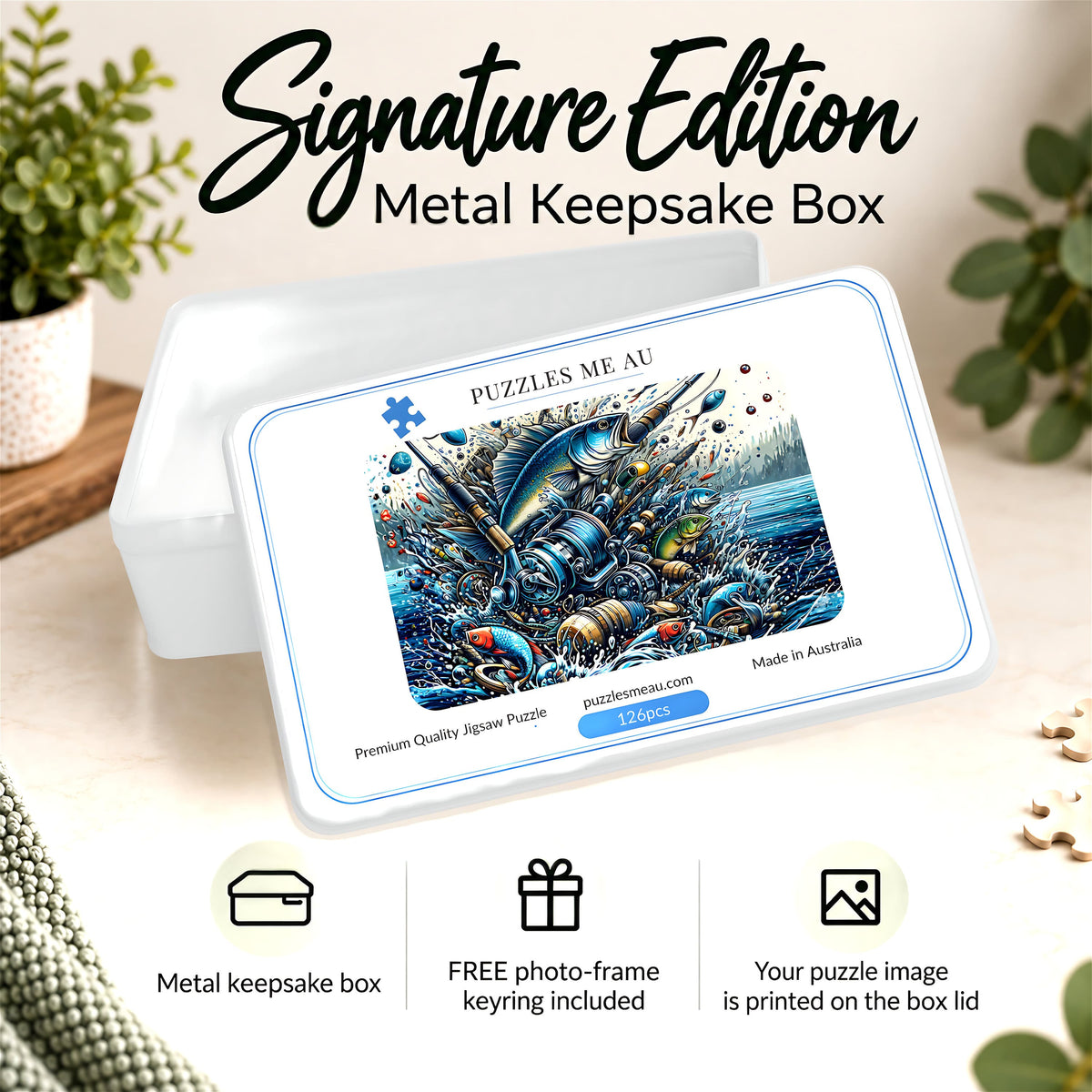 Puzzles Me AU Signature Edition metal keepsake box for Fishing Frenzy 126-piece magnetic puzzle - bold, illustrated fishing scene with leaping fish and reels, premium gift-ready packaging, handmade in Queensland Australia