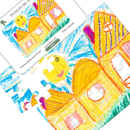 Personalised wooden puzzle 30 pieces by Puzzles Me AU - child's crayon drawing artwork with puzzle pieces spread out and Signature Edition metal keepsake box, handmade in Queensland Australia